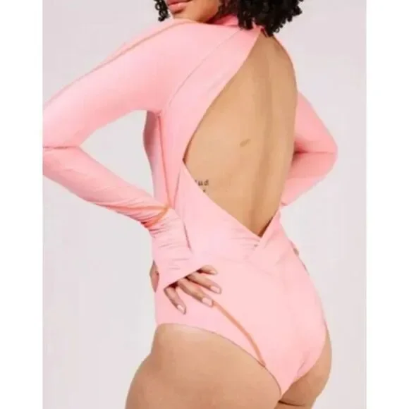 New. Hot as hell for Free People pink rash guard. Large. Retails $240